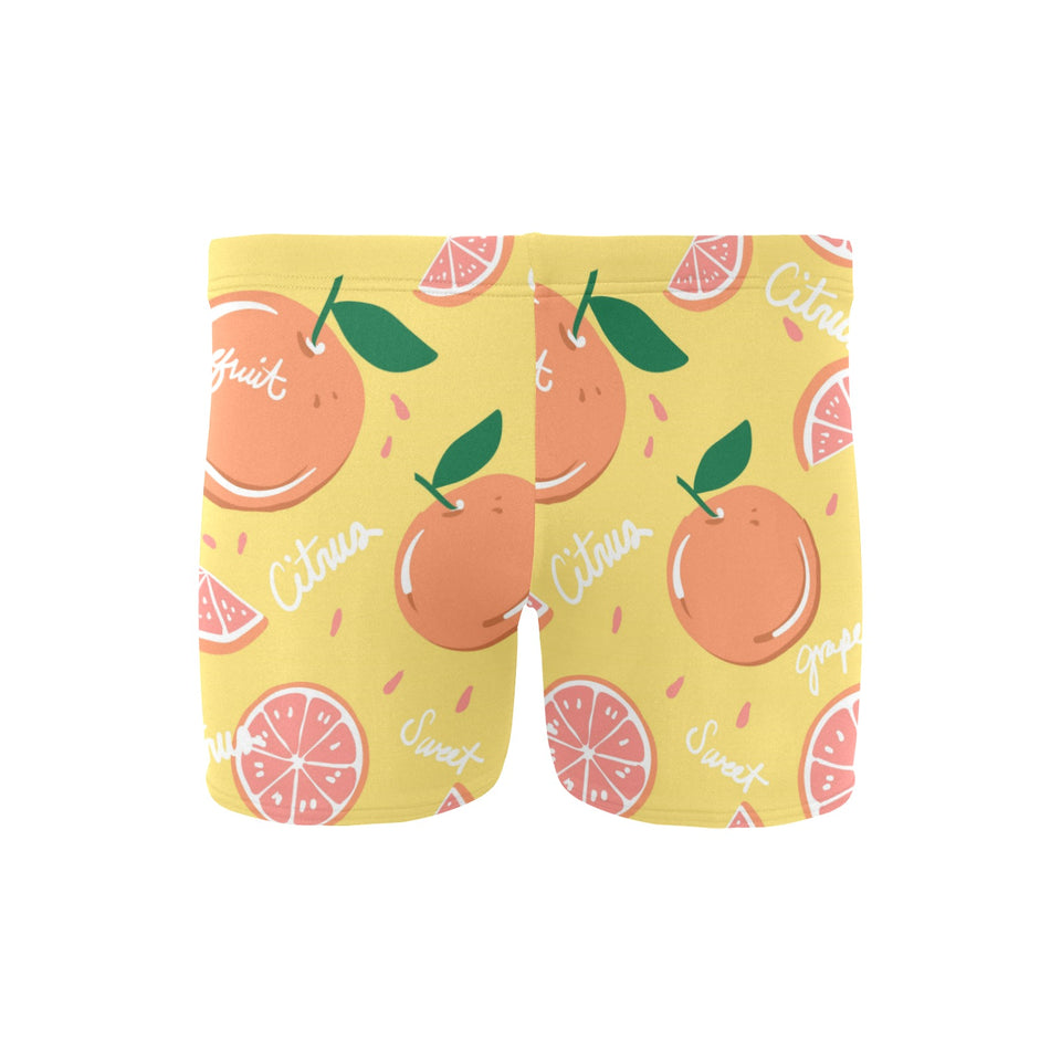 Grapefruit yellow background Men's Swimming Trunks
