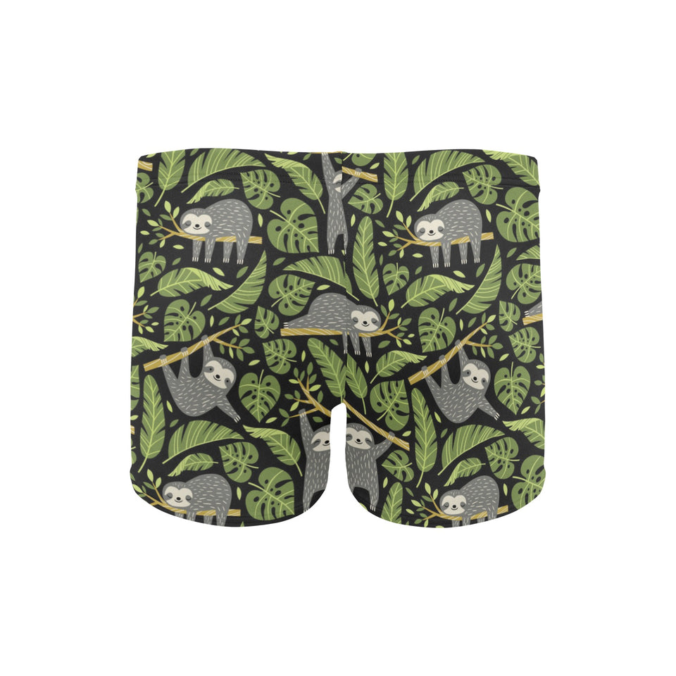 Cute sloths tropical palm leaves black background Men's Swimming Trunks