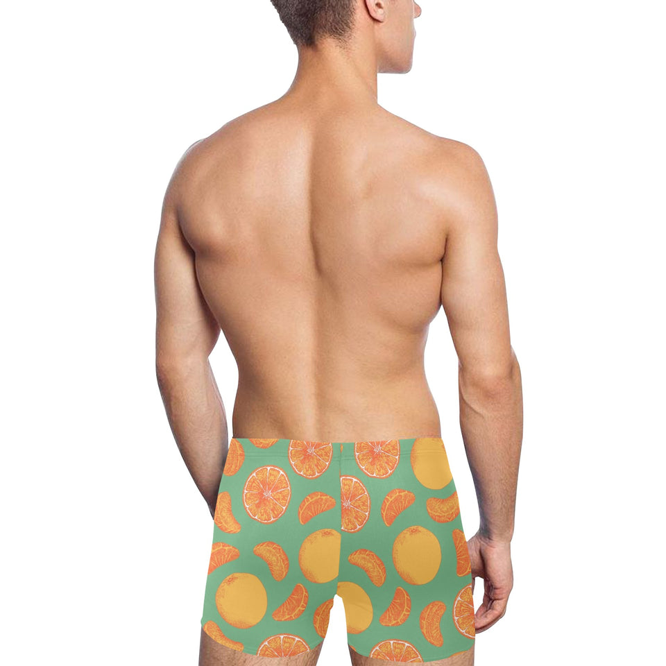 orange fruit pattern green background Men's Swimming Trunks