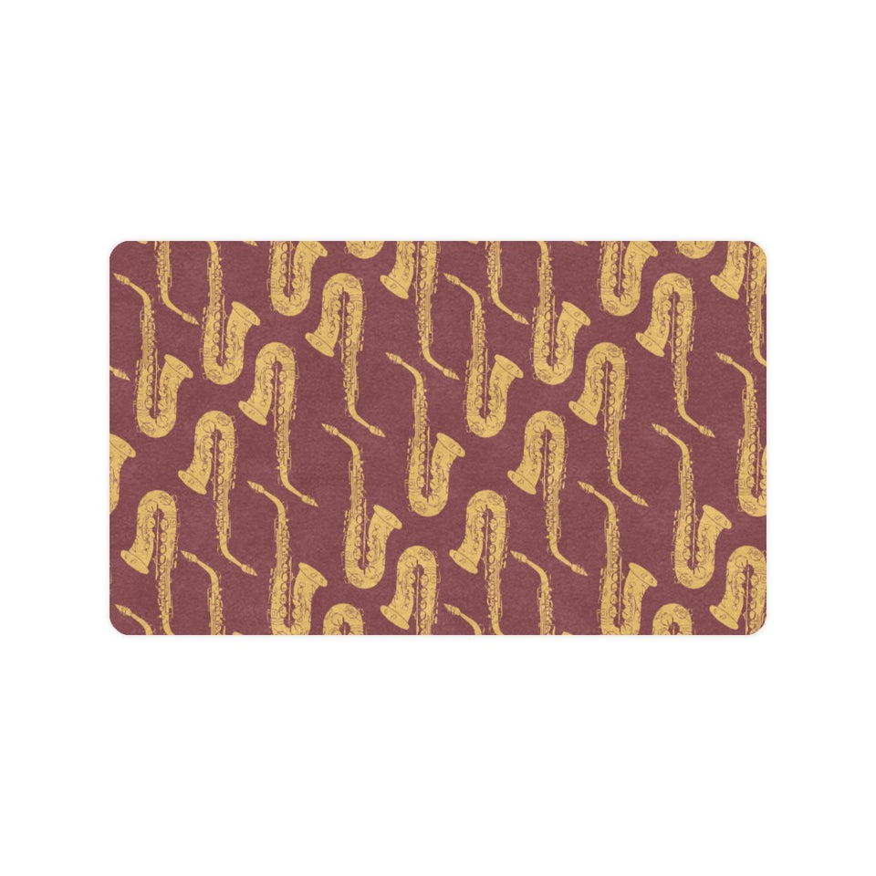 Hand drawn gold saxophone red background Doormat