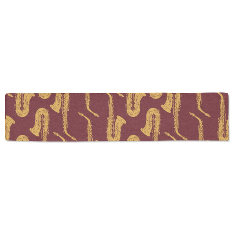 Hand drawn gold saxophone red background Table Runner