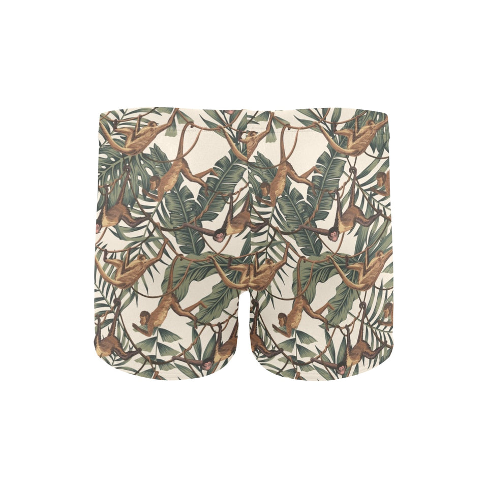 Monkey tropical leaves background Men's Swimming Trunks