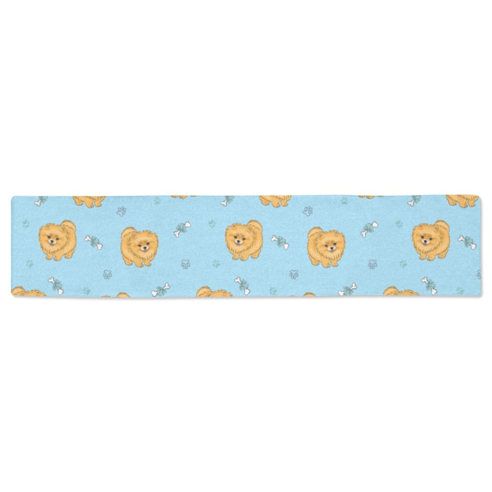 Brown cute pomeranian blue blackground Table Runner