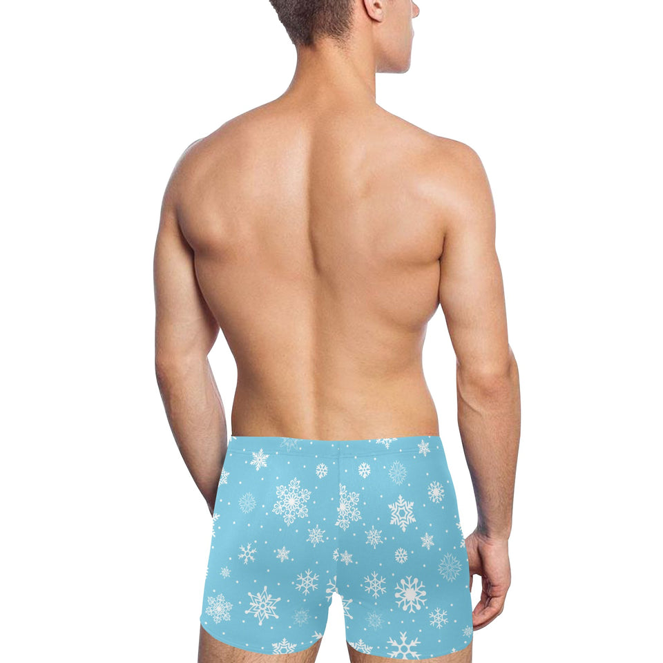 Snowflake pattern blue background Men's Swimming Trunks