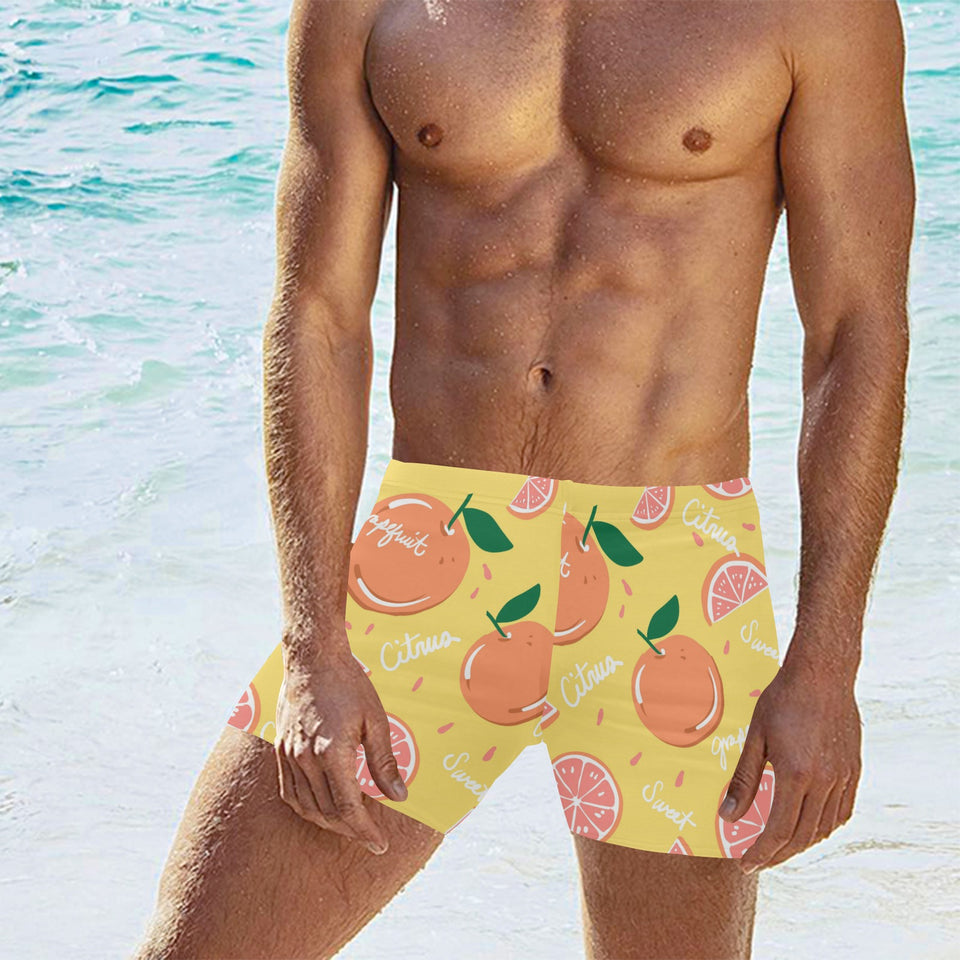 Grapefruit yellow background Men's Swimming Trunks