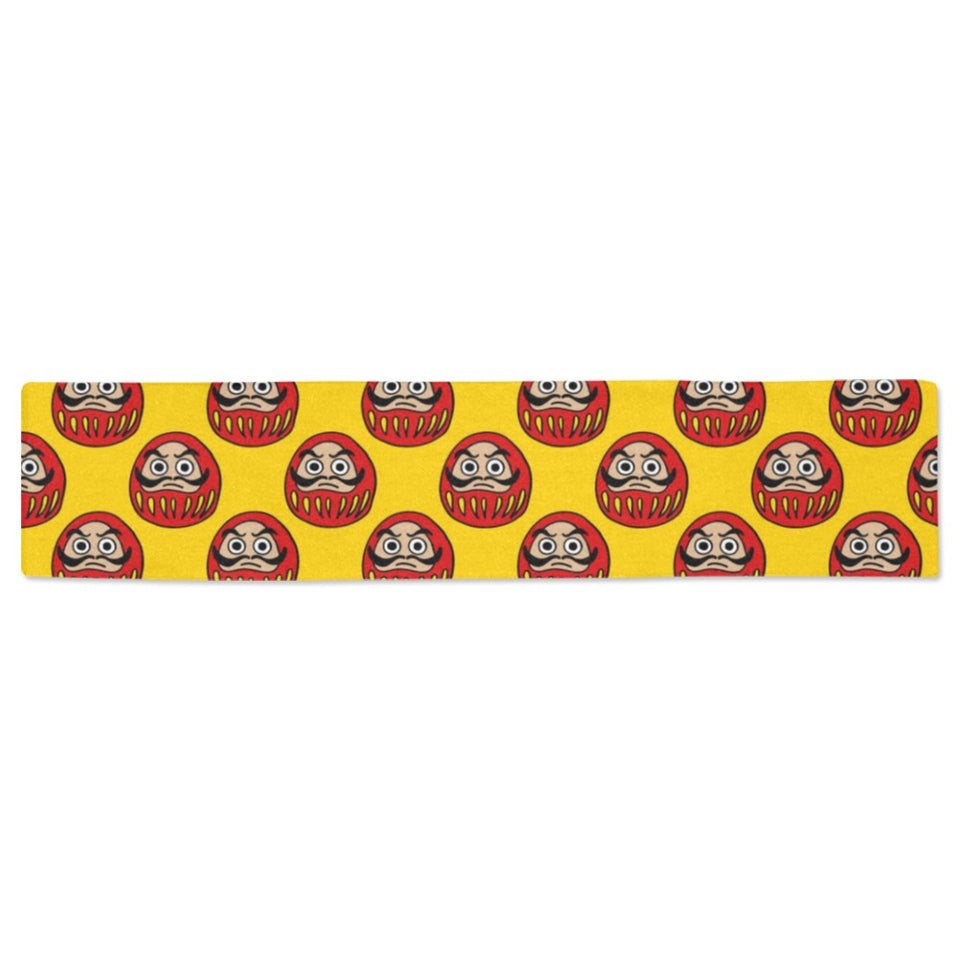 Daruma japanese wooden doll yellow background Table Runner