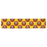 Daruma japanese wooden doll yellow background Table Runner