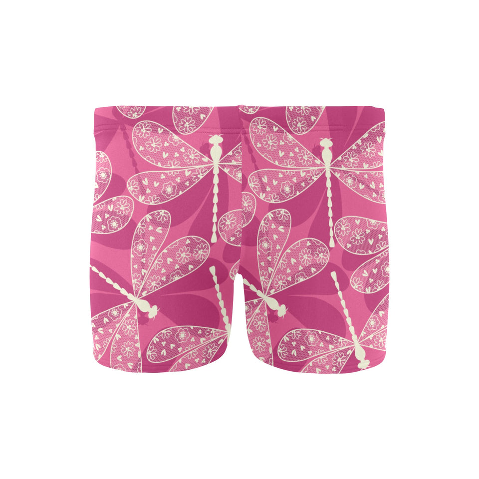 Beautiful dragonfly pink background Men's Swimming Trunks