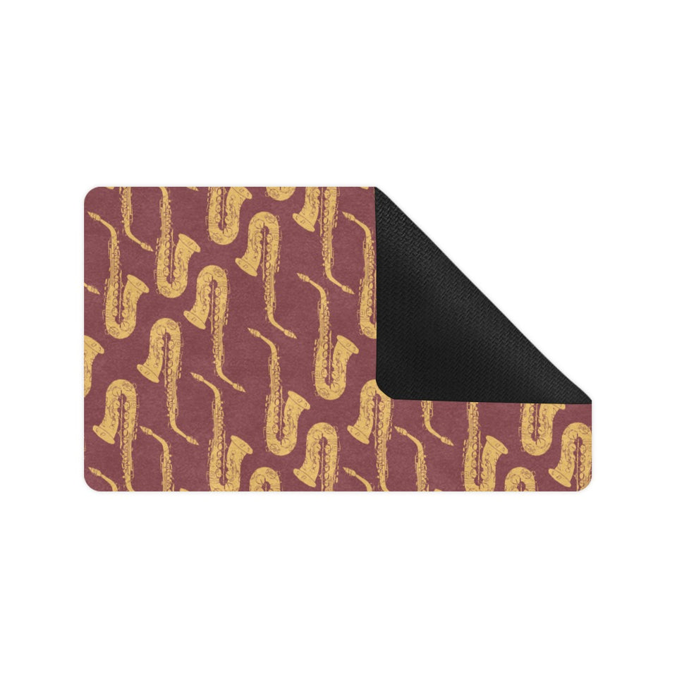 Hand drawn gold saxophone red background Doormat