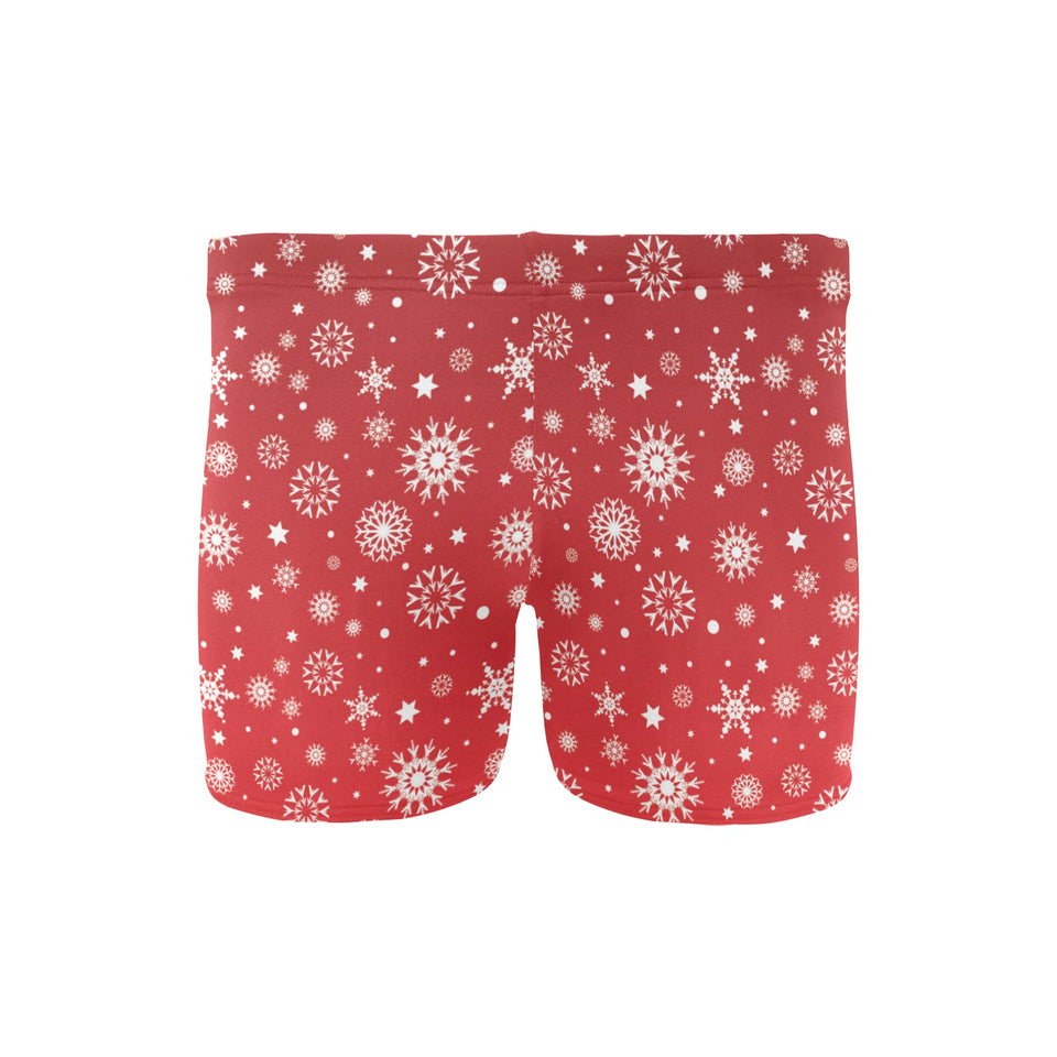 Snowflake pattern red background Men's Swimming Trunks