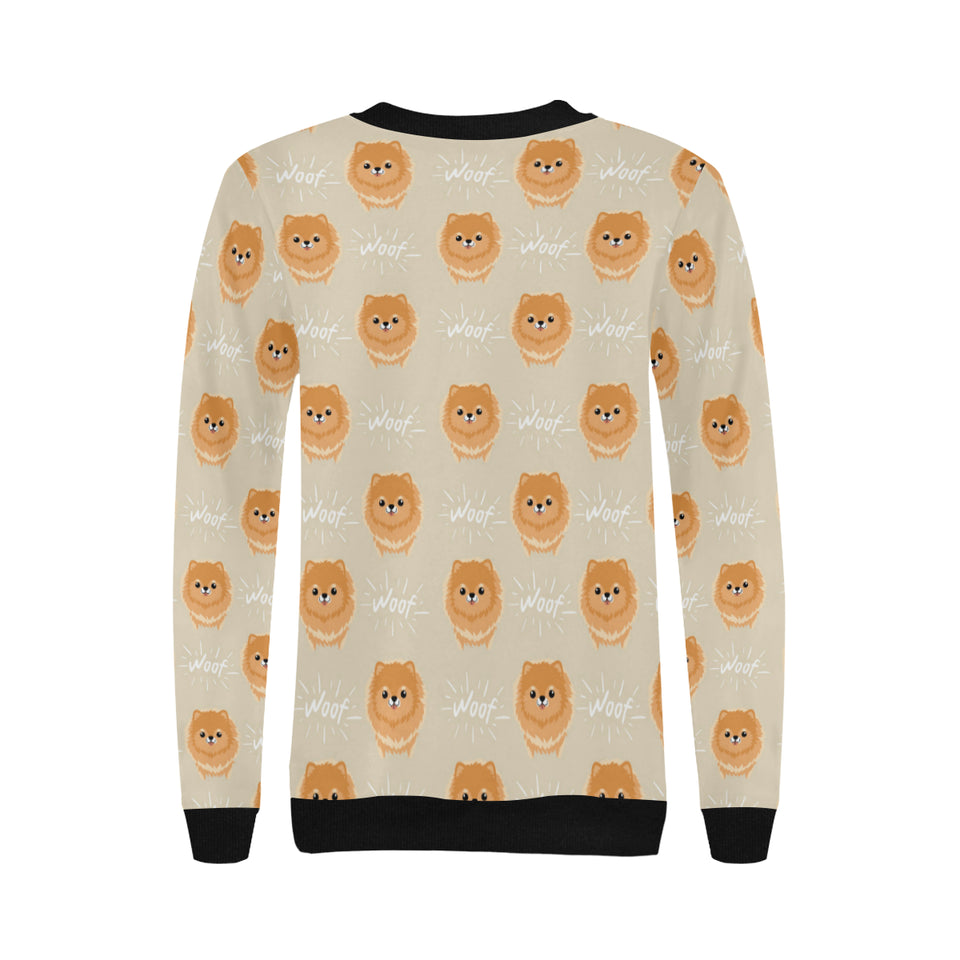 Cute brown pomeranian puppy on blue Women's Crew Neck Sweatshirt