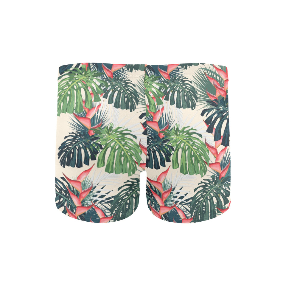 heliconia flowers, palm and monstera leaves Men's Swimming Trunks
