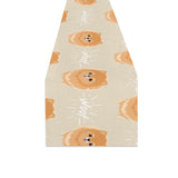 Cute brown pomeranian puppy on blue Table Runner