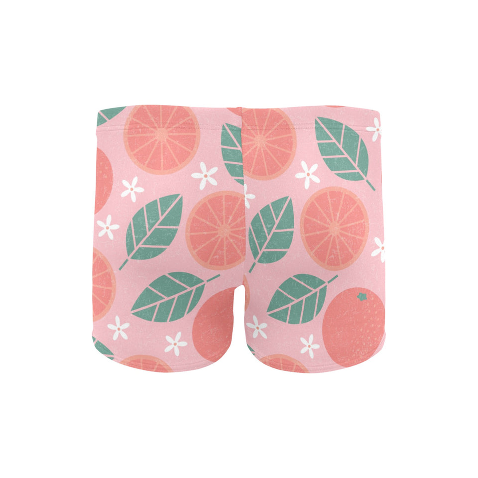 Grapefruit leaves flower pink background Men's Swimming Trunks