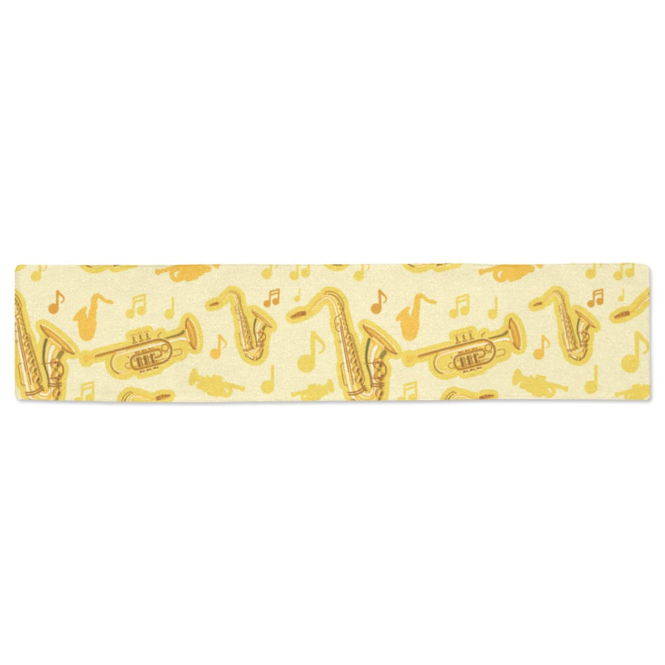 Saxophone cornet pattern yellow background Table Runner