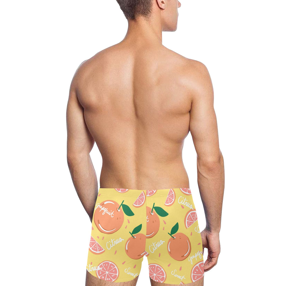 Grapefruit yellow background Men's Swimming Trunks