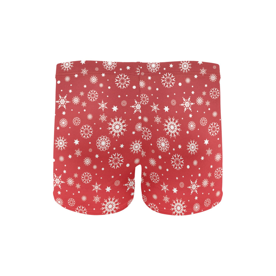 Snowflake pattern red background Men's Swimming Trunks
