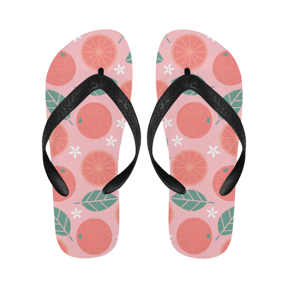 Grapefruit leaves flower pink background Unisex Flip Flops