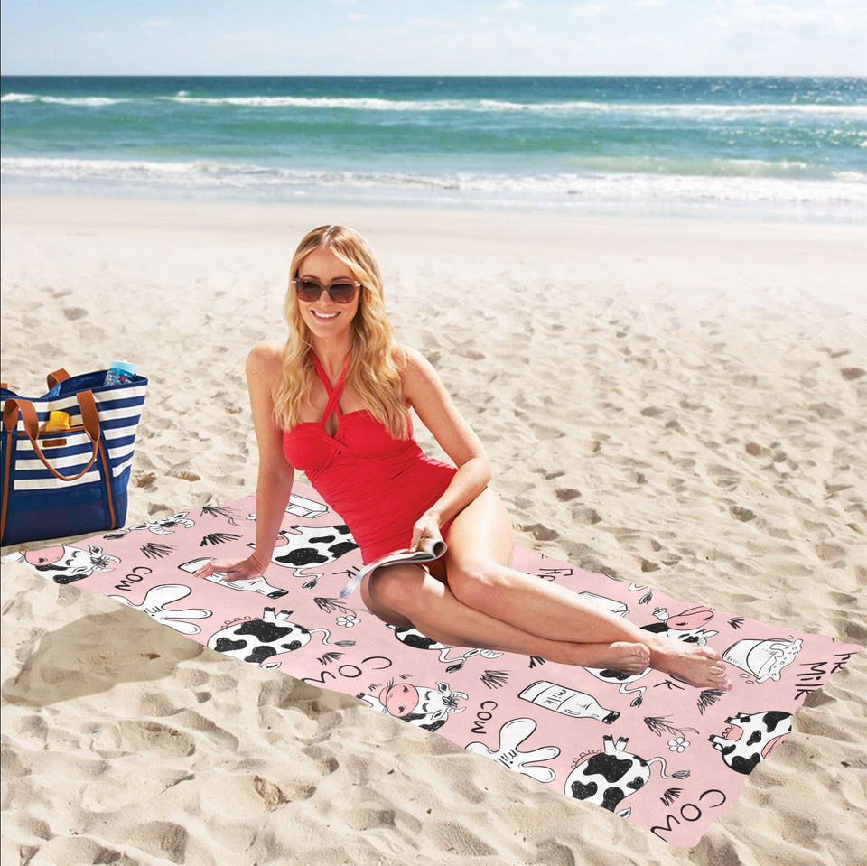 Cows milk product pink background Beach Towel