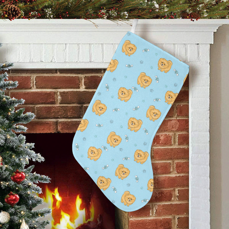 Brown cute pomeranian blue blackground Christmas Stocking