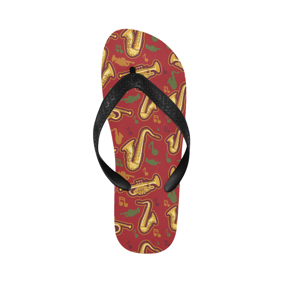 Saxophone cornet pattern red background Unisex Flip Flops