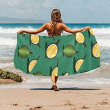Durian pattern green background Beach Towel