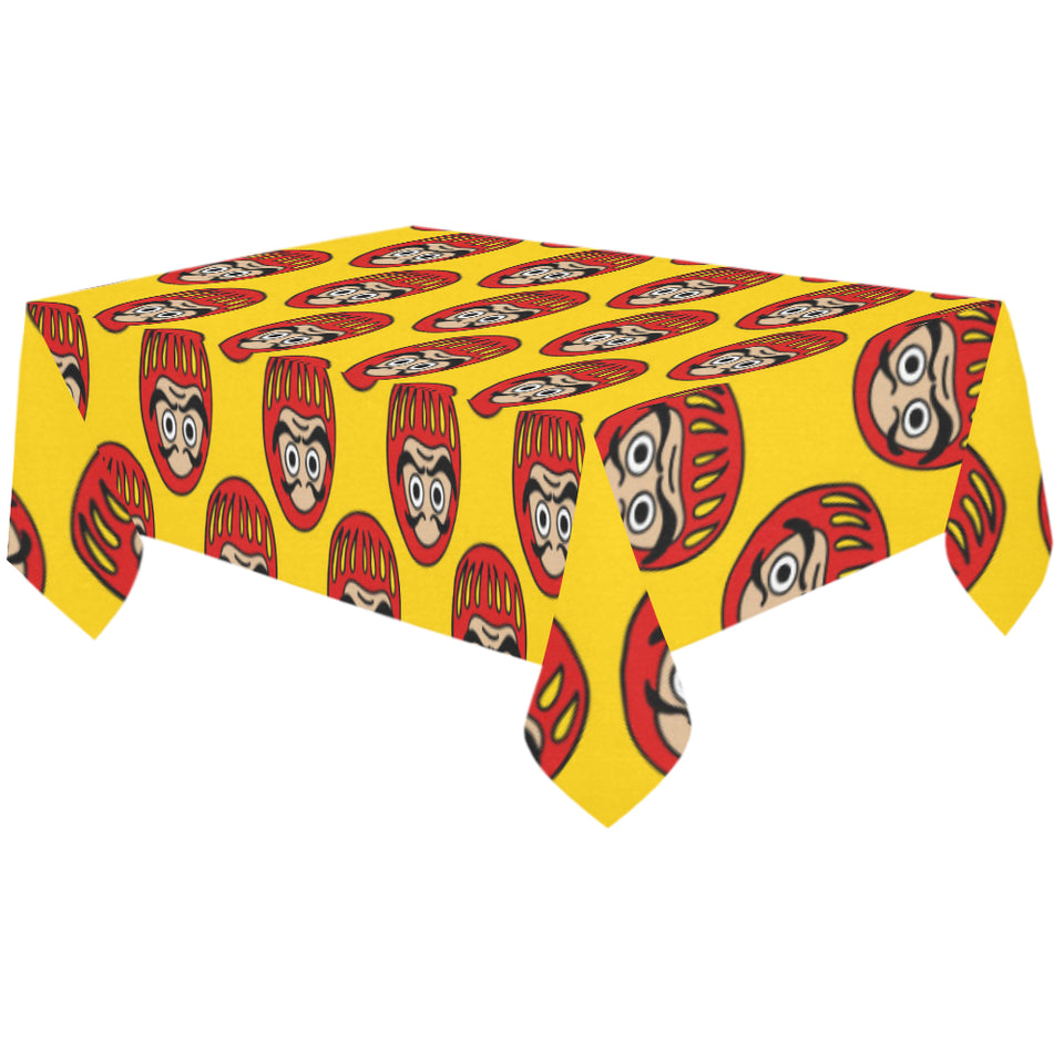 Daruma japanese wooden doll yellow background Tablecloth