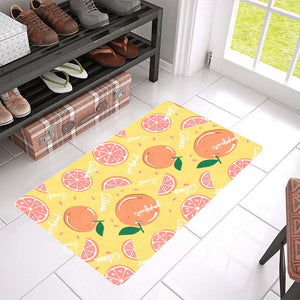Grapefruit yellow background Doormat