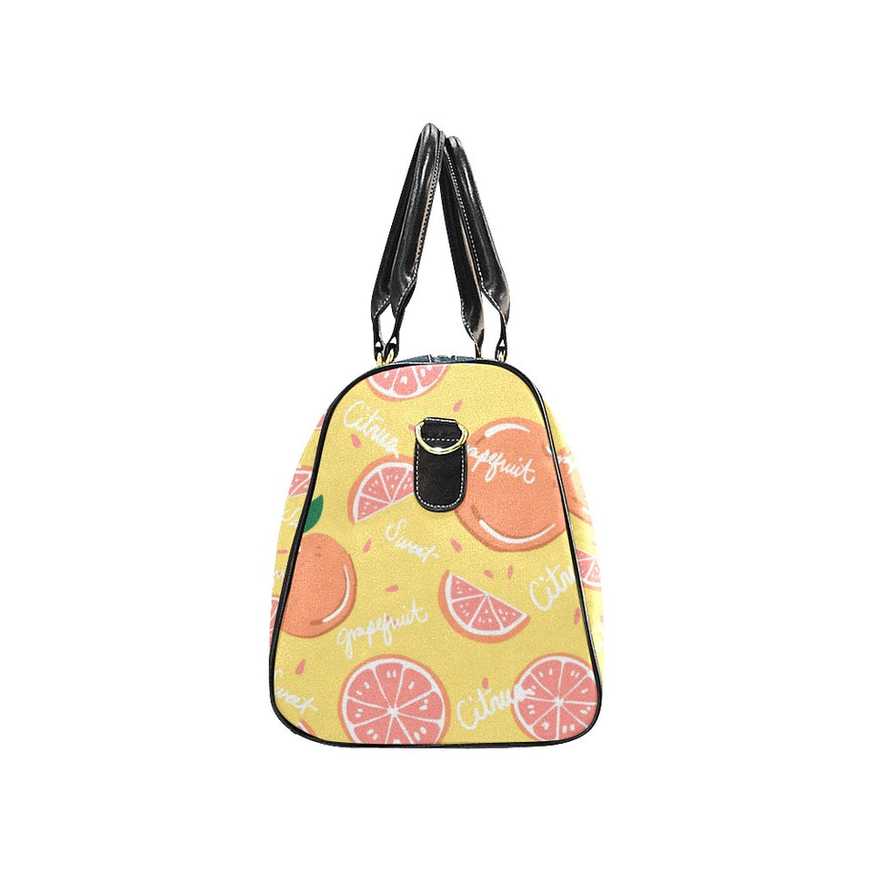 Grapefruit yellow background Travel Bag