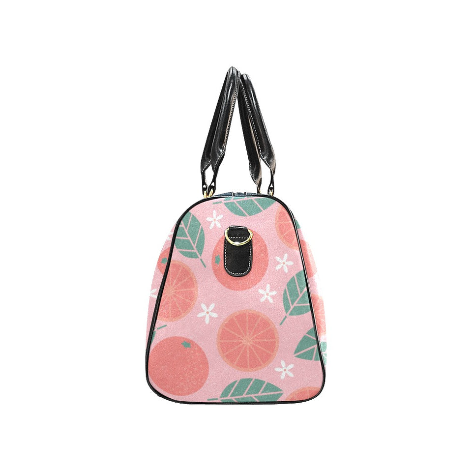 Grapefruit leaves flower pink background Travel Bag