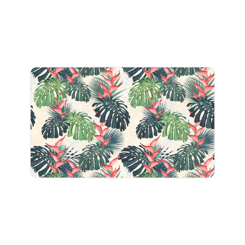 heliconia flowers, palm and monstera leaves Doormat