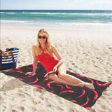 Chili peppers pattern black background Beach Towel