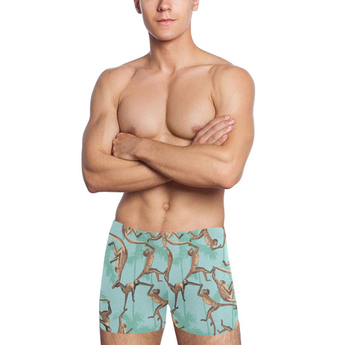 Monkey Palm tree background Men's Swimming Trunks