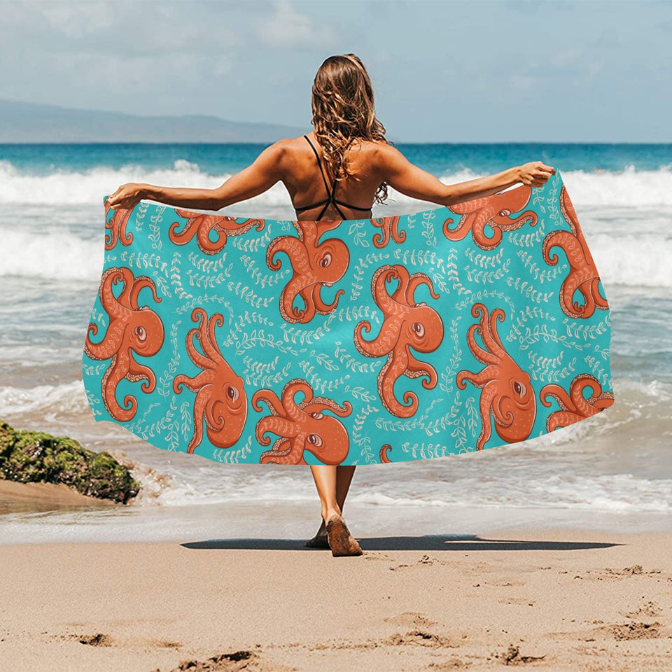 Octopus turquoise background Beach Towel