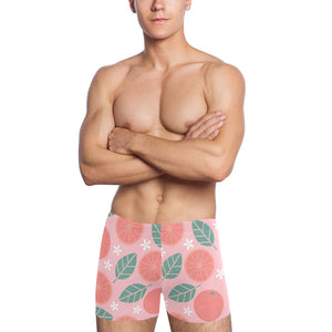 Grapefruit leaves flower pink background Men's Swimming Trunks