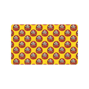 Daruma japanese wooden doll yellow background Doormat
