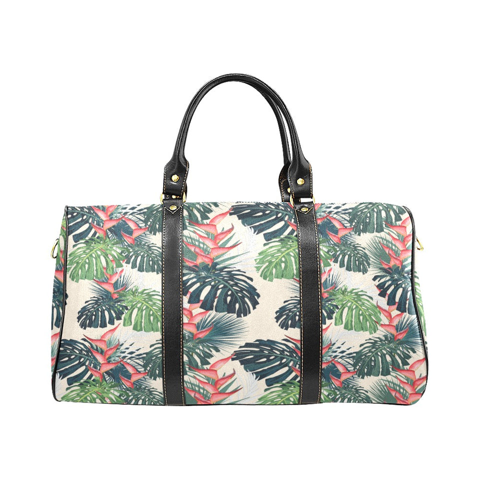 heliconia flowers, palm and monstera leaves Travel Bag