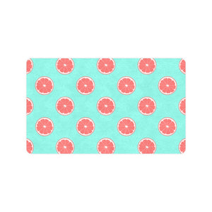 Grapefruit green background Doormat
