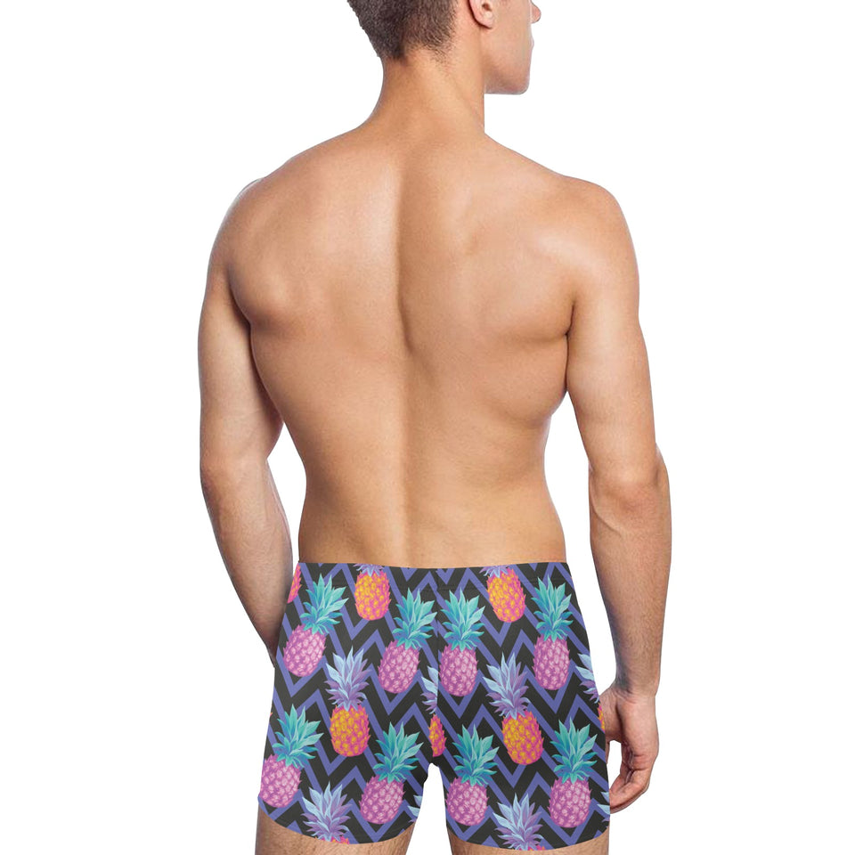 Pineapples pattern zigzag background Men's Swimming Trunks