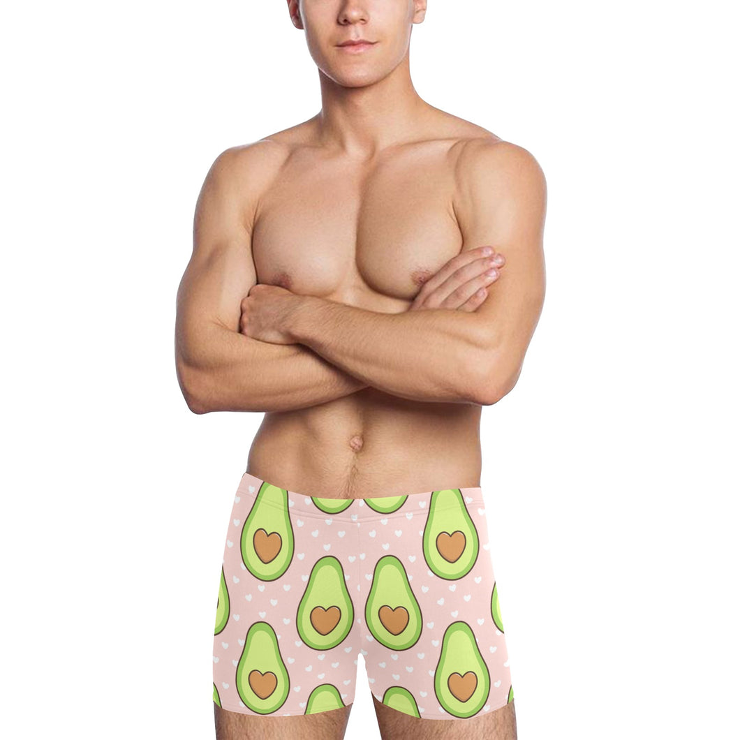 Avocado heart pink background Men's Swimming Trunks