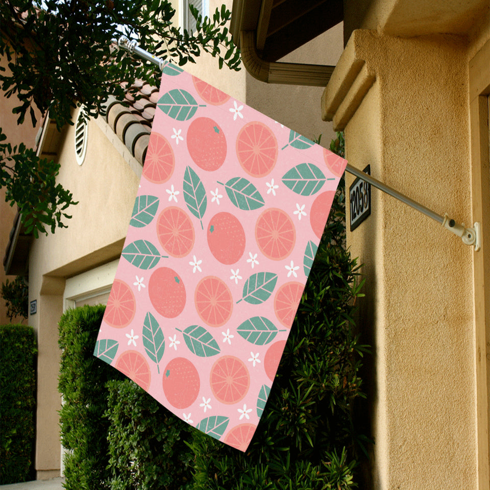 Grapefruit leaves flower pink background House Flag Garden Flag