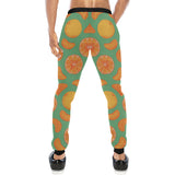 orange fruit pattern green background Unisex Casual Sweatpants