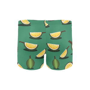 Durian pattern green background Men's Swimming Trunks