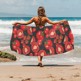 Tomato black background Beach Towel