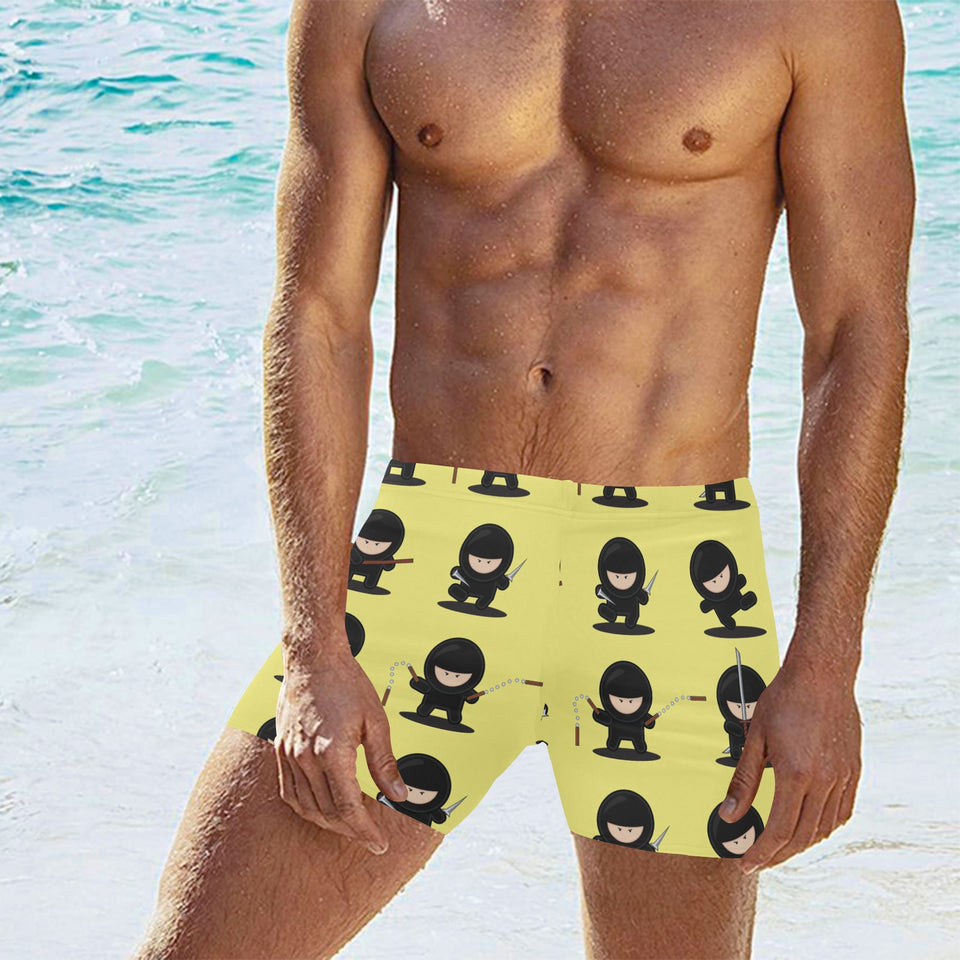 Cute ninja yellow background Men's Swimming Trunks