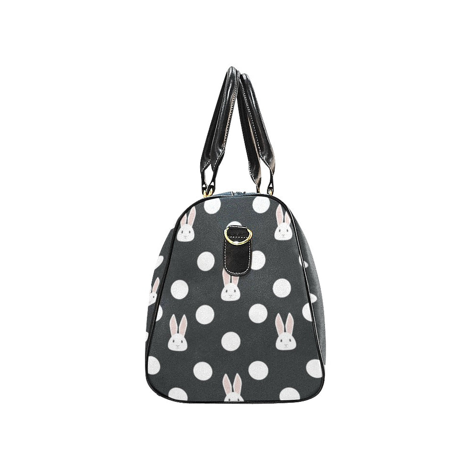 Cute white rabbit polka dots black background Travel Bag