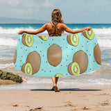 Kiwi blue background Beach Towel