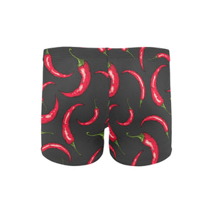 Chili peppers pattern black background Men's Swimming Trunks