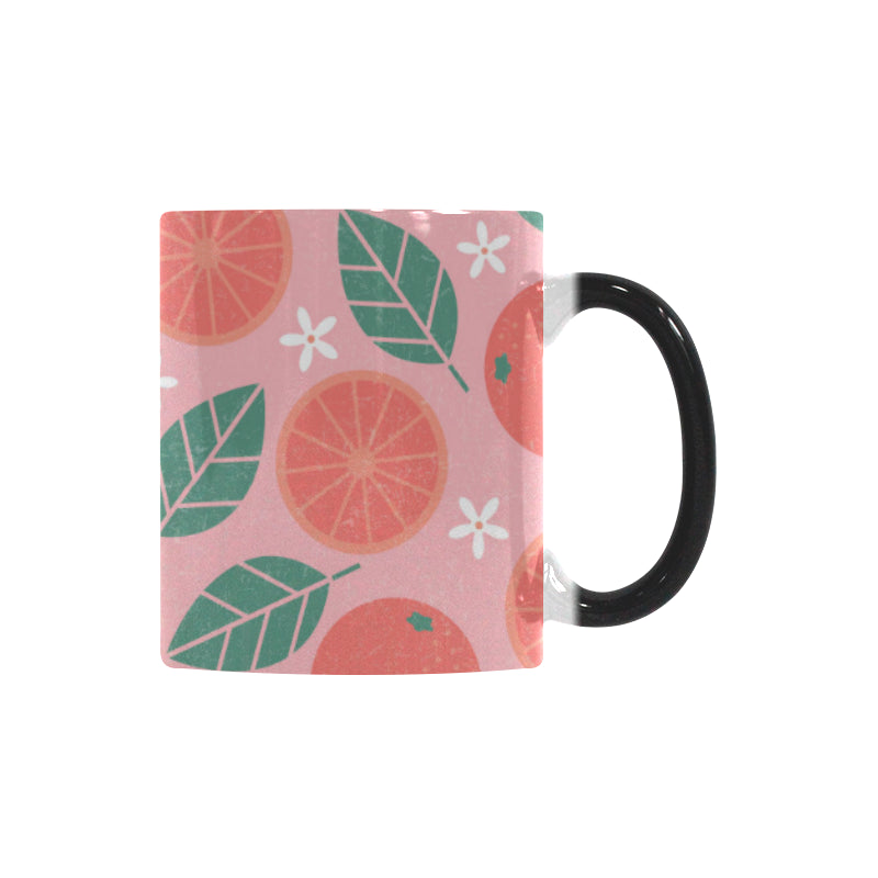 Grapefruit leaves flower pink background Morphing Mug Heat Changing Mug