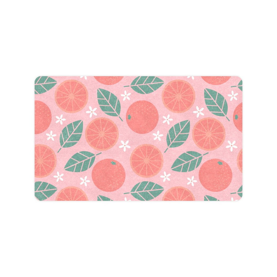 Grapefruit leaves flower pink background Doormat